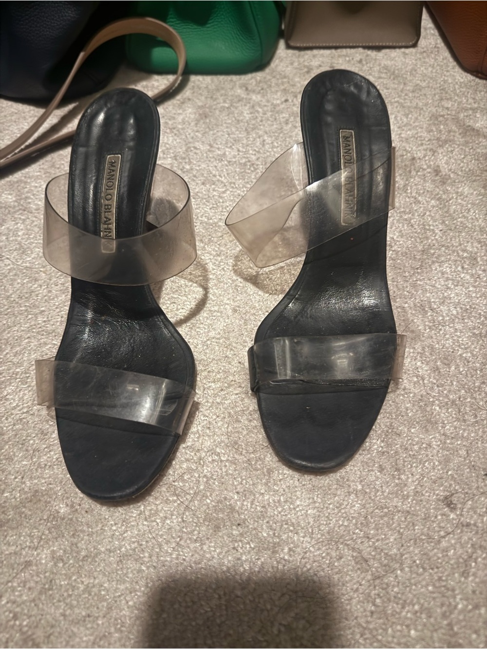 Manolo Blahnik 'Scolto' beige PVC and leather mules, featuring clear straps